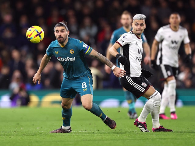 Wolverhampton Wanderers's Ruben Neves in action with Fulham's Andreas Pereira on February 24, 2023