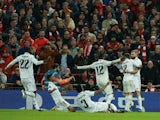 Real Madrid's Karim Benzema celebrates scoring against Liverpool on February 21, 2023