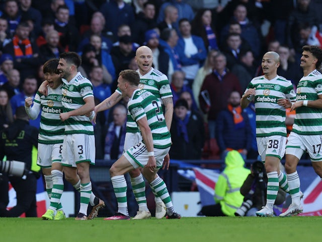 Celtic's Kyogo Furuhashi celebrates scoring their first goal with Greg Taylor, Alistair Johnston, Aaron Mooy, Daizen Maeda and Jota on February 26, 2023