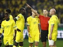 Nantes' Nicolas Pallois reacts after being shown a red card by referee Jose Sanchez on February 23, 2023