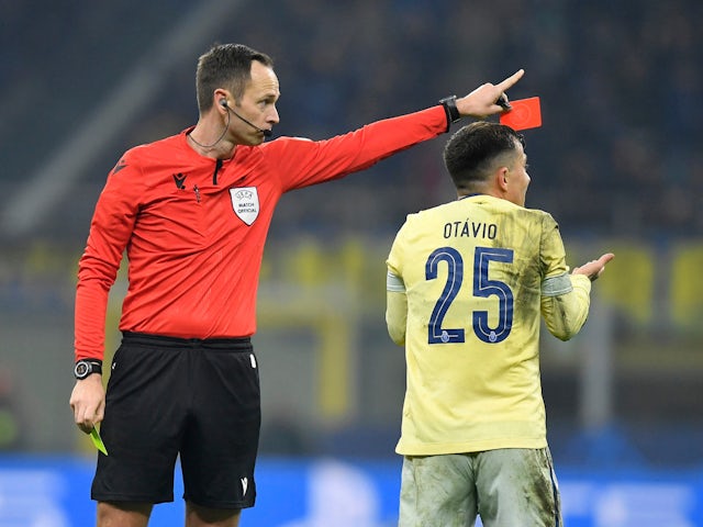 FC Porto's Otavio reacts after being shown a red card by referee Srdjan Jovanovic after receiving two yellow cards on February 22, 2023