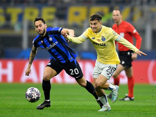 Inter Milan's Hakan Calhanoglu in action with FC Porto's Otavio on February 22, 2023
