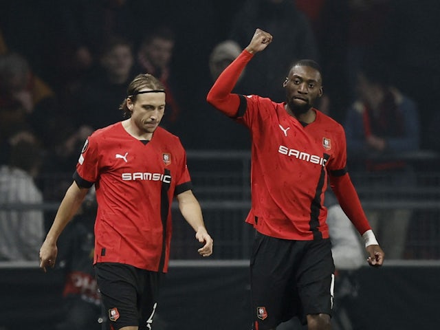 Rennes' Karl Toko Ekambi celebrates scoring their first goal with Lovro Majer on February 23, 2023