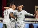 San Jose Earthquakes forward Jeremy Ebobisse (11) celebrates with midfielder Cristian Espinoza (10) and defender Paul Marie (3) in the first half against the Atlanta United FC at Mercedes-Benz Stadium on February 25, 2023
