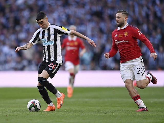 Newcastle United's Miguel Almiron in action with Manchester United's Luke Shaw on February 26, 2023