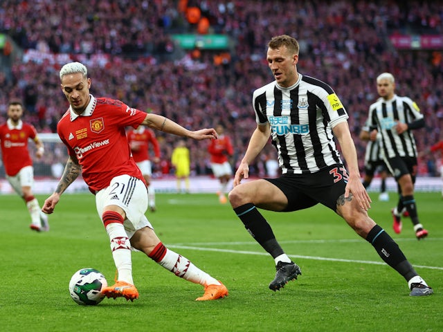 Manchester United's Antony in action with Newcastle United's Dan Burn on February 26, 2023