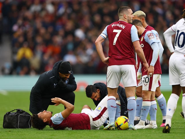 Aston Villa's Boubacar Kamara receives medical attention after sustaining an injury on March 4, 2023