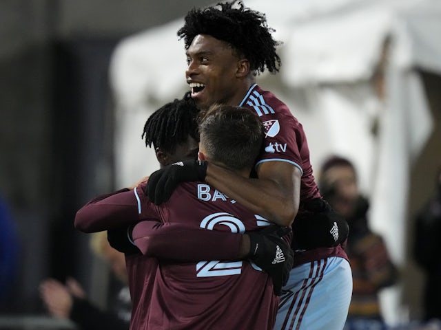 Colorado Rapids midfielder Ralph Priso (97) and midfielder Cole Bassett (23) and forward Darren Yapi (77) celebrate during the first half against Sporting Kansas City at Dick's Sporting Goods Park on March 4, 2023
