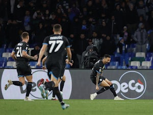 Lazio slow Napoli title charge to move second