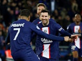 Paris Saint-Germain's (PSG) Lionel Messi celebrates scoring their first goal with Kylian Mbappe and Sergio Ramos on March 4, 2023