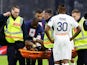 Paris Saint-Germain's Presnel Kimpembe is stretchered off on February 26, 2023