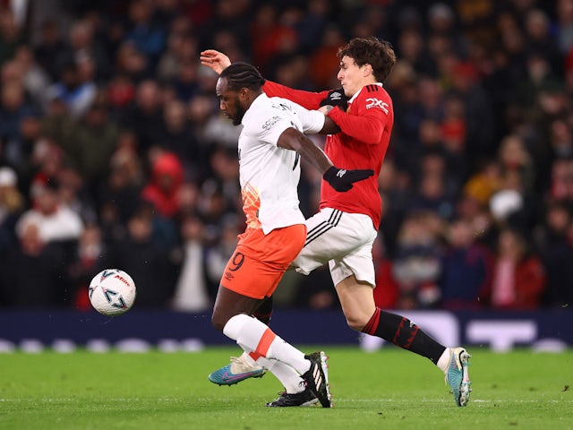 West Ham United's Michail Antonio in action with Manchester United's Victor Lindelof on March 1, 2023