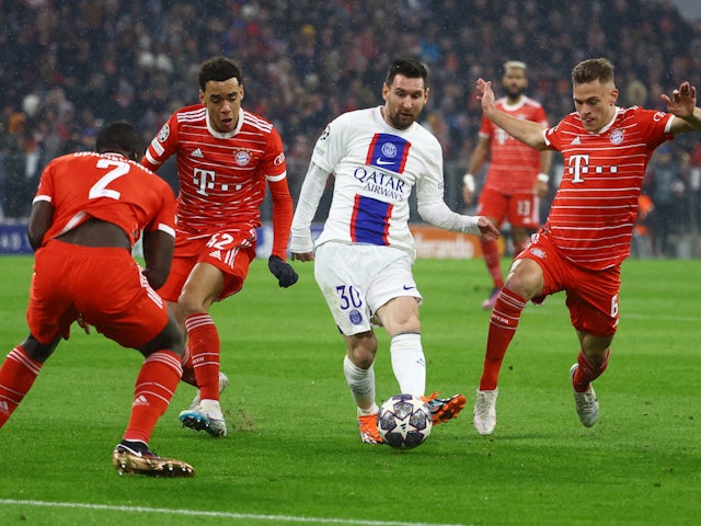 Paris Saint-Germain's Lionel Messi in action with Bayern Munich's Jamal Musiala and Joshua Kimmich on March 8, 2023