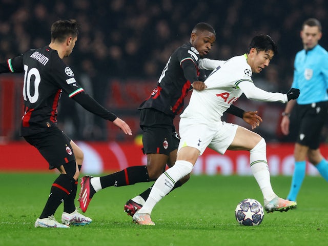 AC Milan's Brahim Diaz and Pierre Kalulu in action with Tottenham Hotspur's Son Heung-min on March 8, 2023