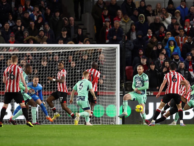 Brentford's Ethan Pinnock scores against Fulham on March 6, 2023