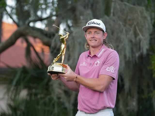 Cameron Smith displays the champions trophy after winning The Players Championship golf tournament at TPC Sawgrass on March 14, 2022