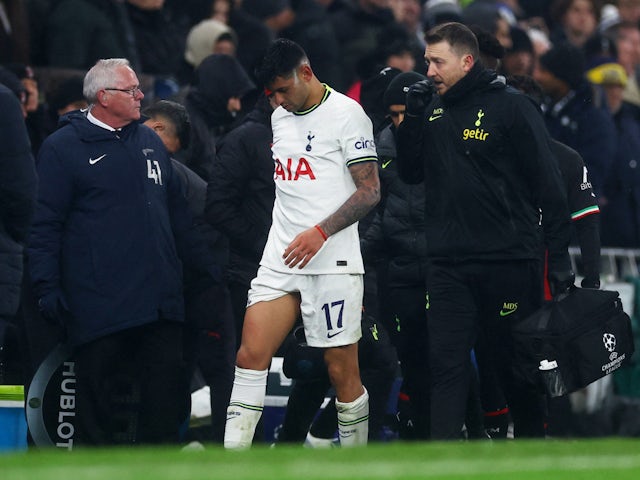 Tottenham Hotspur's Cristian Romero walks off the field after being sent off on March 8, 2023