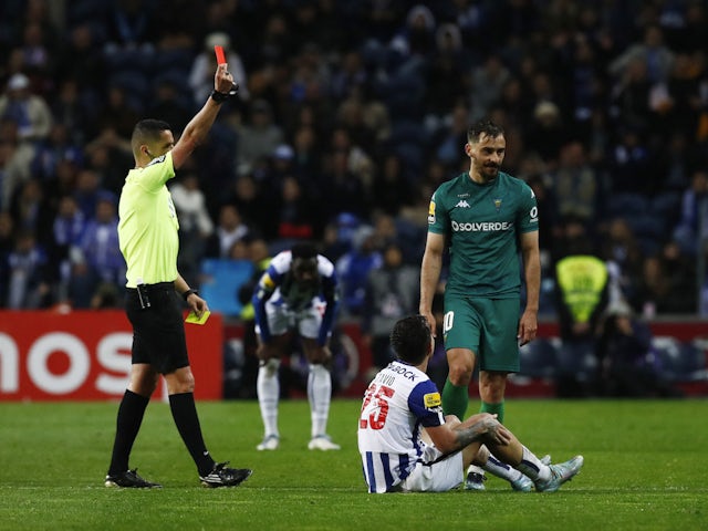 Estoril Praia's Francisco Geraldes is shown a red card by referee Gustavo Correia on March 10, 2023