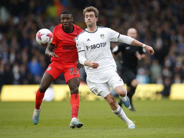 Leeds United's Patrick Bamford in action with Brighton & Hove Albion's Moises Caicedo on March 11, 2023