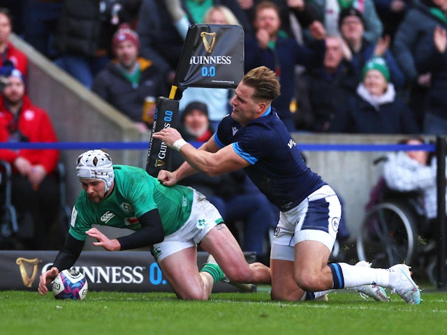 Ireland's Mack Hansen scores their first try on March 12, 2023