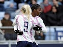 Manchester City Women's Khadija Shaw celebrates scoring their first goal with Chloe Kelly on March 5, 2023