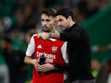 Arsenal manager Mikel Arteta pictured with Fabio Vieira on March 9, 2023