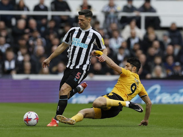 Newcastle United's Fabian Schar in action with Wolverhampton Wanderers' Raul Jimenez on March 12, 2023