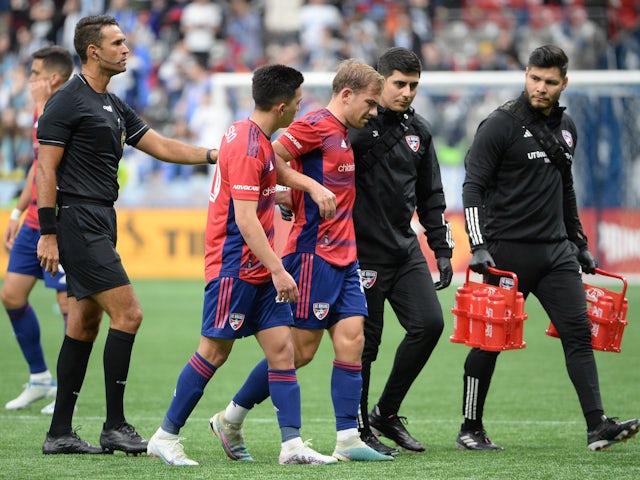 FC Dallas midfielder Paxton Pomykal (19) leaves the field after an injury during the second half at BC Place on March 11, 2023