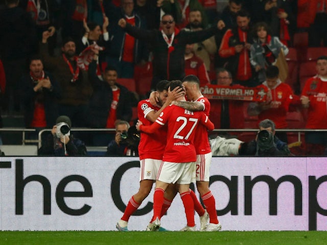 Benfica's Rafa Silva celebrates scoring their first goal with teammates on March 7, 2023