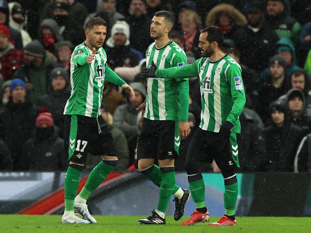 Real Betis' Joaquin and teammates celebrate their first goal scored by Ayoze Perez on March 9, 2023