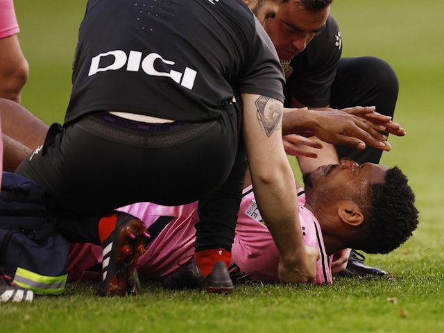 Espanyol's Ronael Pierre-Gabriel receives medical attention after sustaining an injury on March 11, 2023