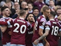 West Ham United's Said Benrahma celebrates scoring their first goal with teammates on March 12, 2023