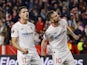 Sevilla's Erik Lamela celebrates scoring their second goal with Ivan Rakitic on March 9, 2023