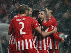 FC Union Berlin's Josip Juranovic celebrates scoring their first goal with teammates on March 9, 2023