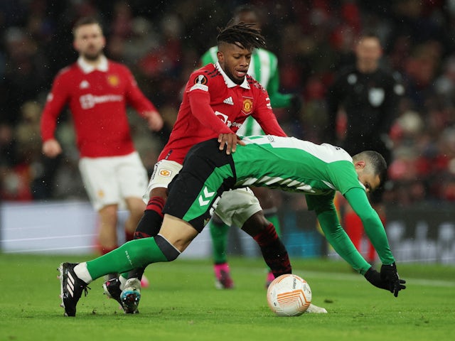 Manchester United's Fred in action with Real Betis' Guido Rodriguez on March 9, 2023
