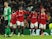 Manchester United players celebrate Bruno Fernandes's goal against Real Betis on March 9, 2023