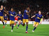 Newcastle United's Alexander Isak celebrates scoring their second goal with teammates on March 17, 2023