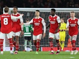 Arsenal players look dejected after being knocked out of the Europa League on March 16, 2023