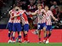Atletico Madrid's Antoine Griezmann celebrates scoring their first goal with teammates on March 18, 2023