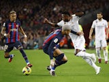 Barcelona's Ronald Araujo in action with Real Madrid's Vinicius Junior on March 19, 2023