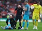 Tottenham Hotspur's Ben Davies goes down injured on March 18, 2023