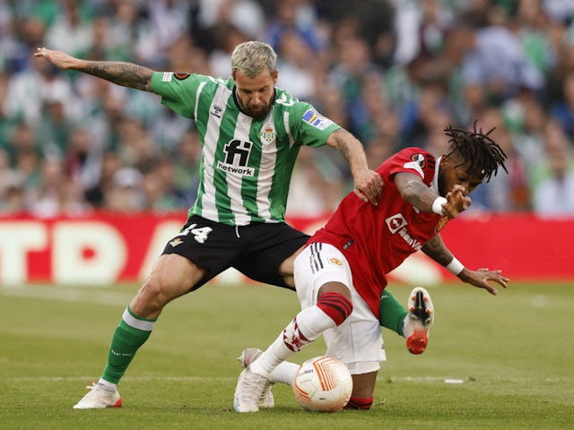 Real Betis' Aitor Ruibal in action with Manchester United's Fred on March 16, 2023