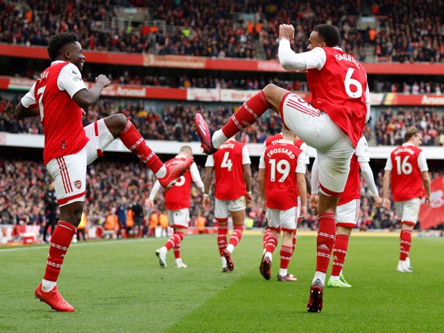 Bukayo Saka celebrates scoring for Arsenal with Gabriel Magalhaes on March 19, 2023