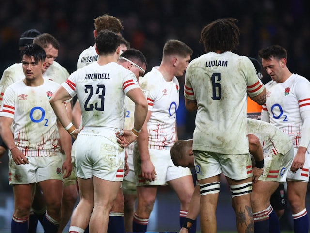 England's Marcus Smith and teammates look dejected on March 11, 2023