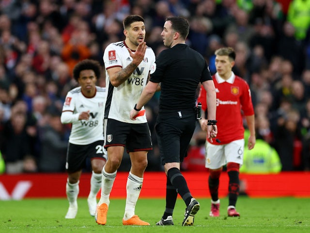 Fulham's Aleksandar Mitrovic reacts after being shown a red card by referee Chris Kavanagh on March 19, 2023