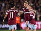 West Ham United's Gianluca Scamacca celebrates scoring their first goal with Lucas Paqueta and Jarrod Bowen on March 16, 2023