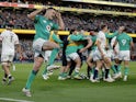 Ireland's Johnny Sexton celebrates after Dan Sheehan scores their first try on March 18, 2023
