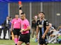 MLS referee Nima Saghafi gives a red card to Philadelphia Union forward Julian Carranza (9) on March 19, 2023