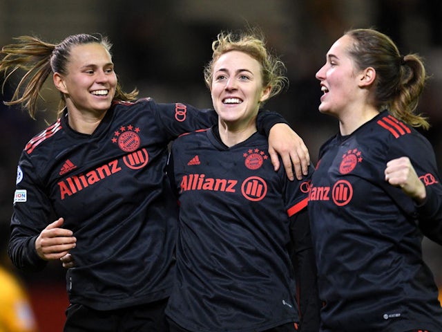 Bayern Munich Women's Klara Buhl celebrates scoring their first goal with Carolin Simon and Sydney Lohman on December 21, 2022