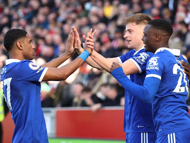 Leicester City's Harvey Barnes celebrates scoring their first goal with Mateus Tete and Patson Daka on March 18, 2023